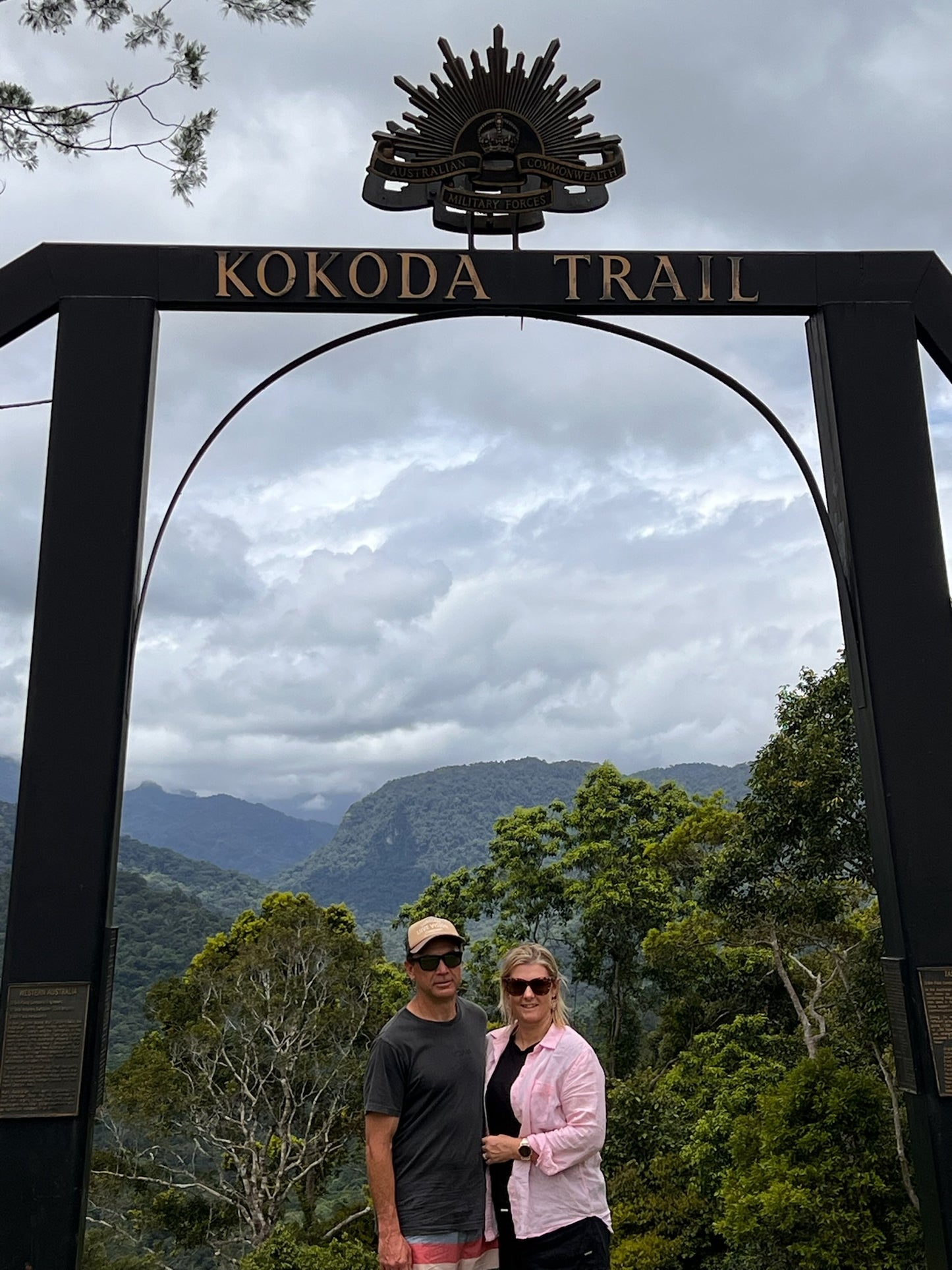 Kokoda Trail two people under track finish arch