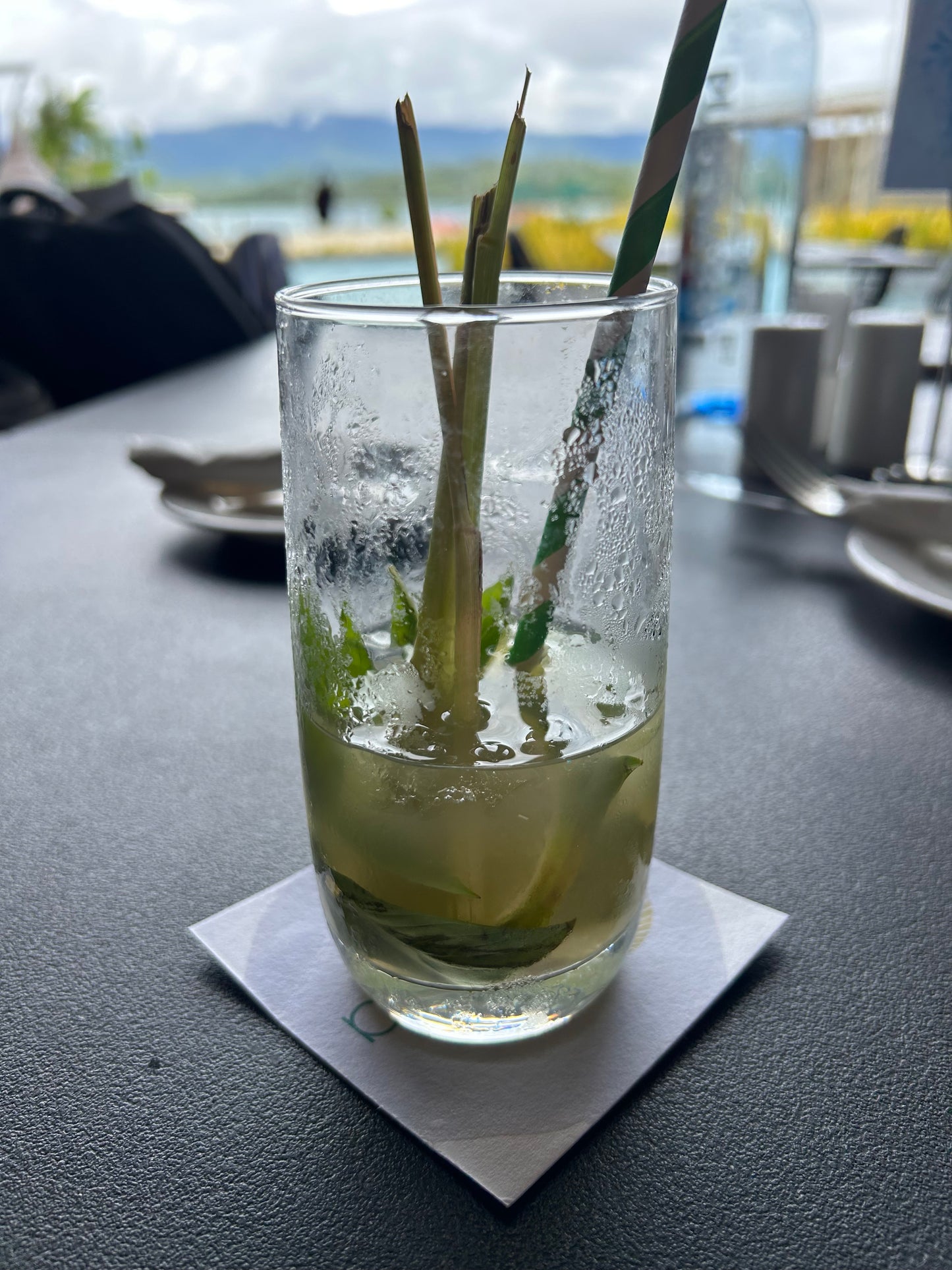 Loloata Resort drink overlooking the pool and ocean