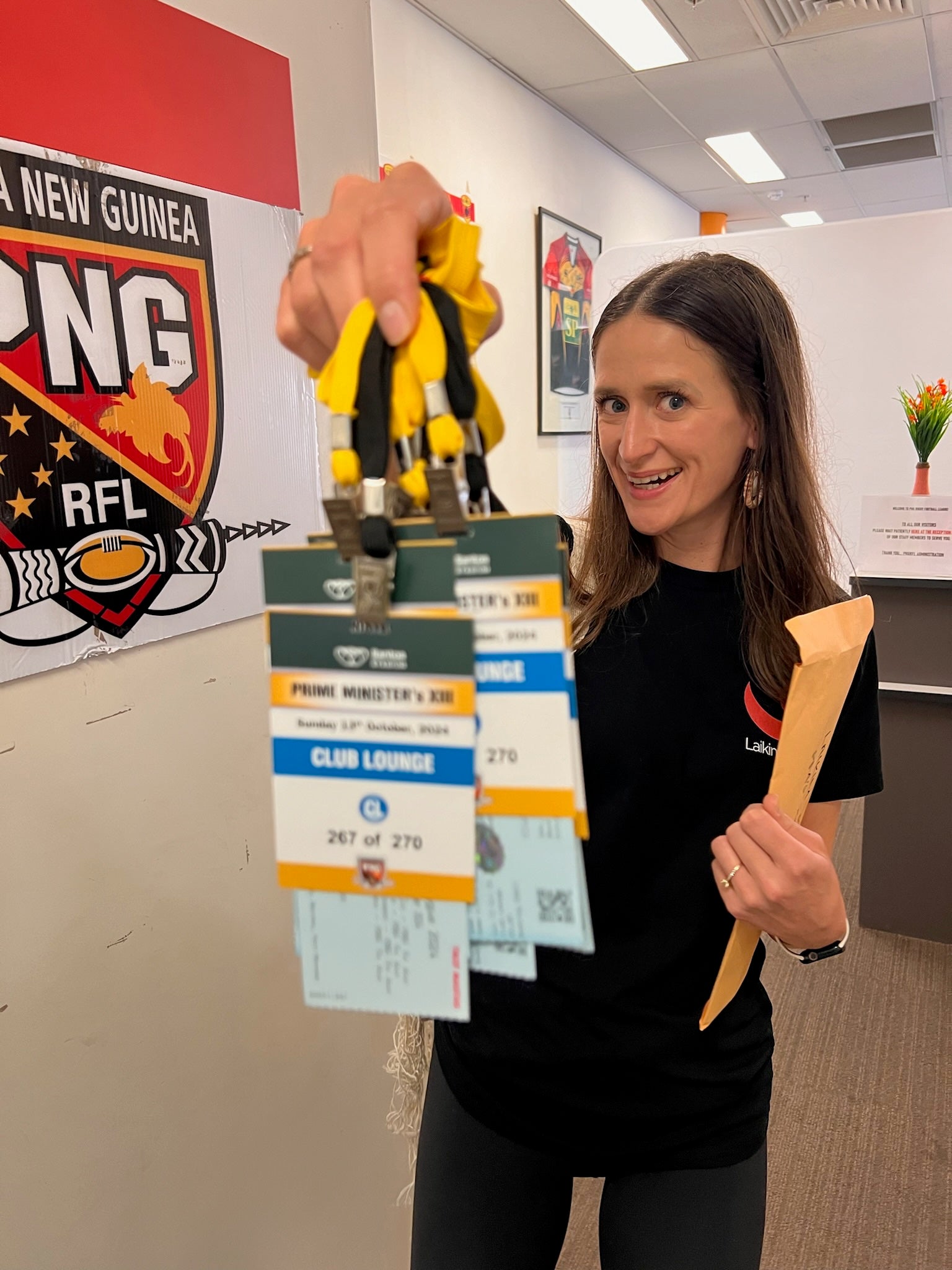 PMs13 holding up the tickets