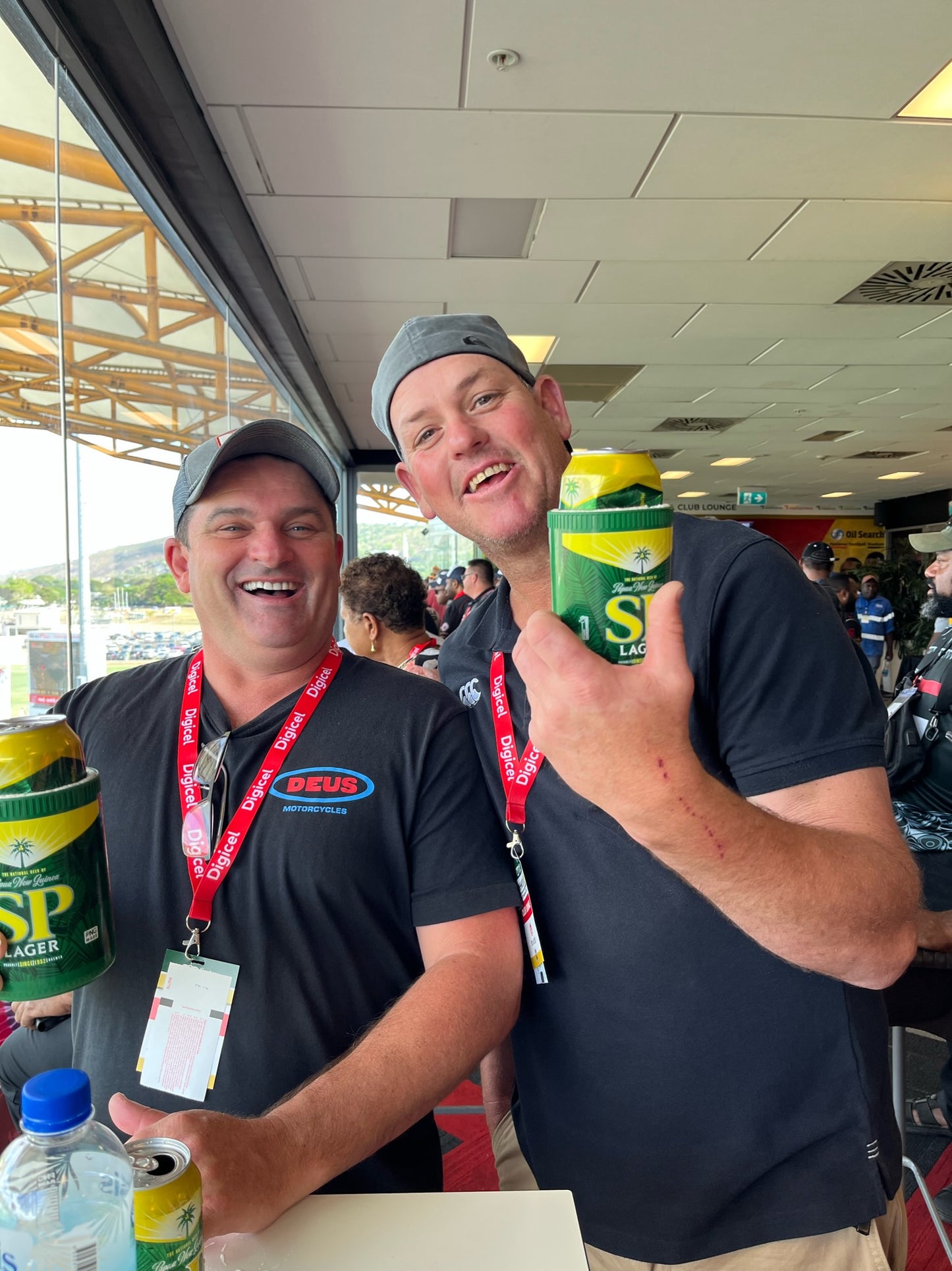 PMs13 two men having a great time in the club lounge