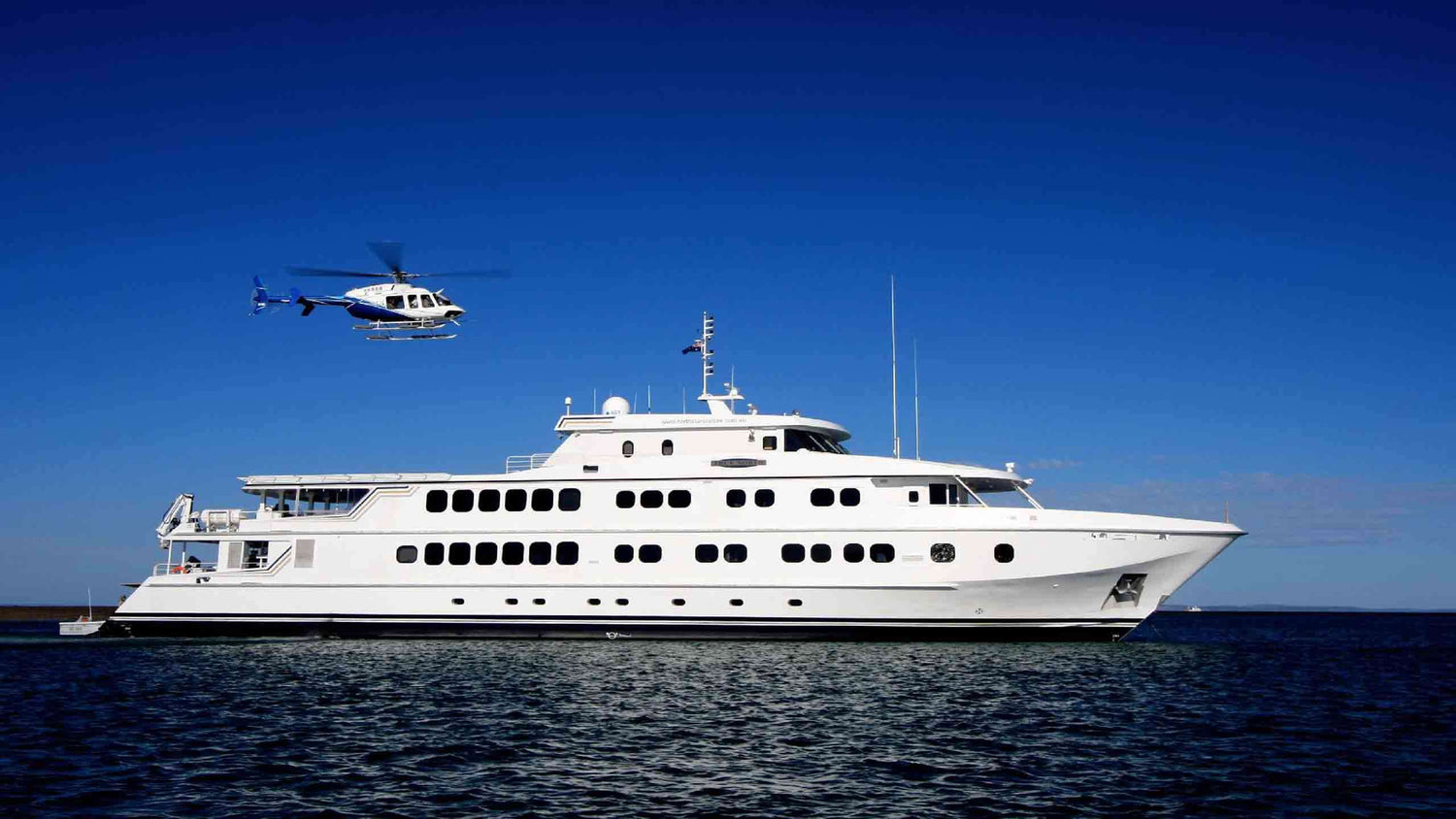 Helicopter coming to land on a super yacht