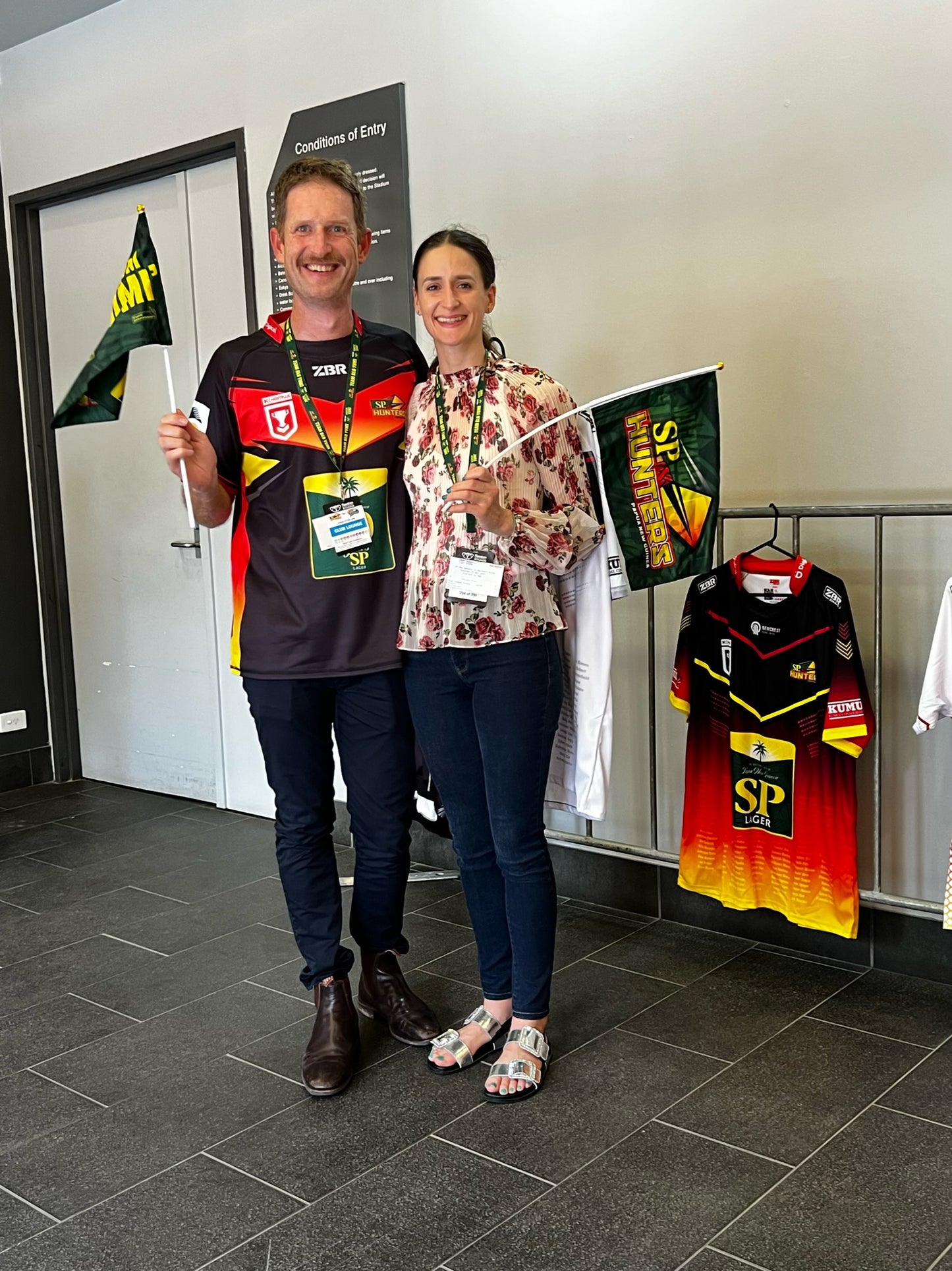 PNG Hunters Britt and Nathan with flags and shirt